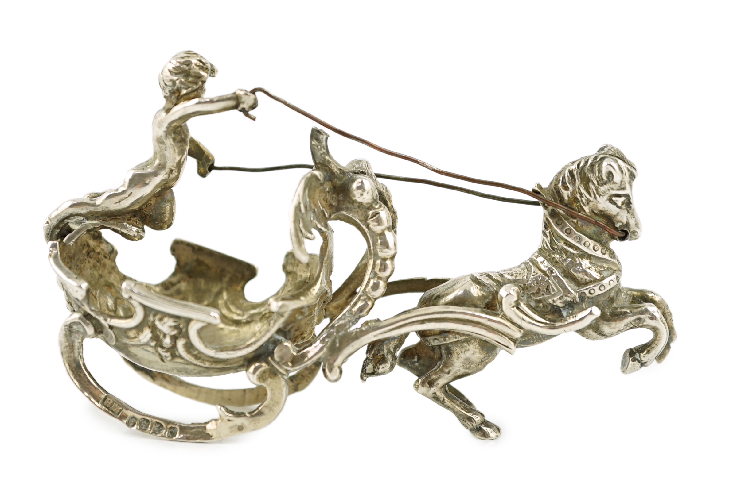 A late 19th century silver miniature model of a horse driven sleigh, with putto, import marks for Berthold Muller